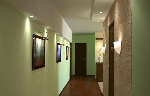 Фото: многоуровневый потолок с точечным освещением и отделка части правой стены декоративной штукатуркой